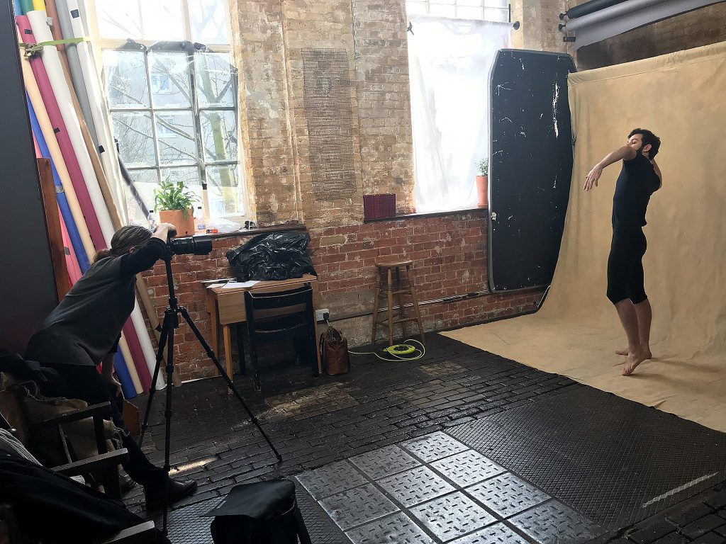 Behind the scenes photo of Maundy Mitchell photographing London mime Ramon Ayres at Espero Studio in London.