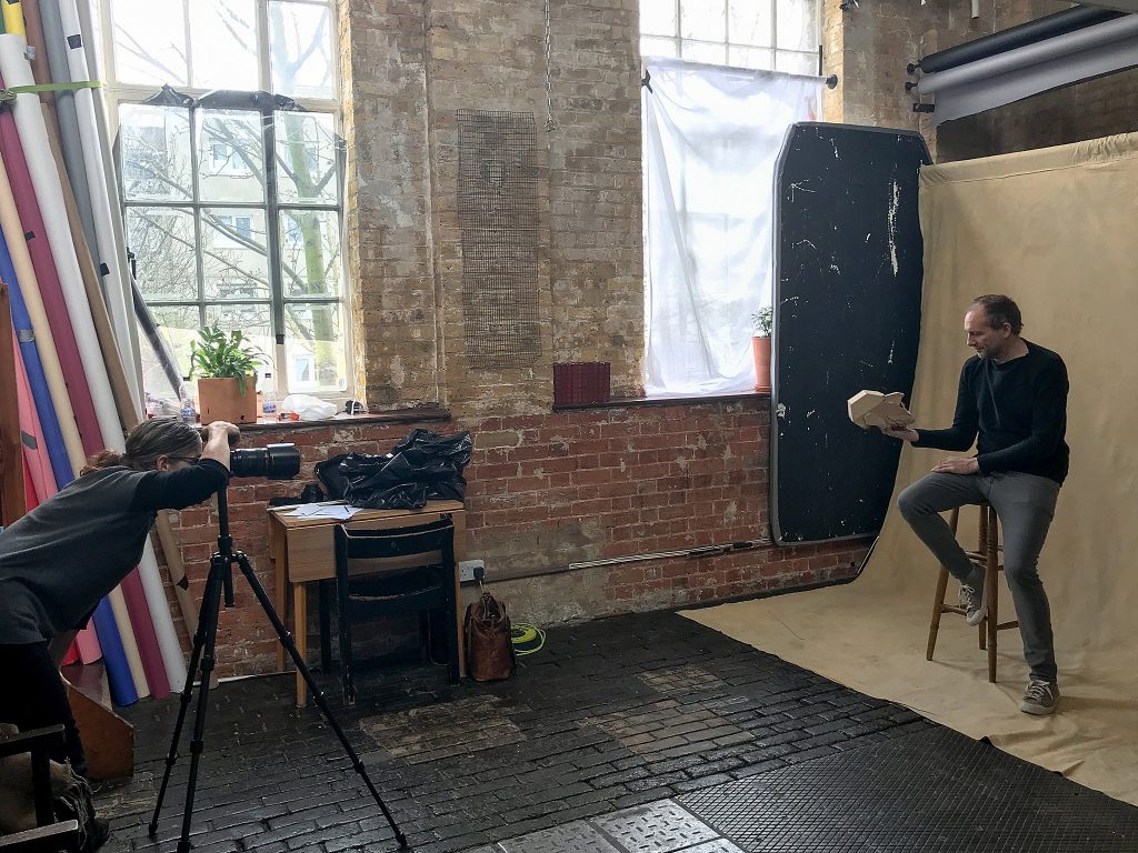 Behind the scenes photo of photographer Maundy Mitchell working with puppeteer Mark Down at Espero Studios in London