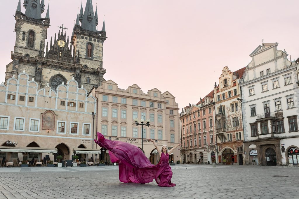 Dancer Lisa Travis in parachute dress in Old Town Square, Prague