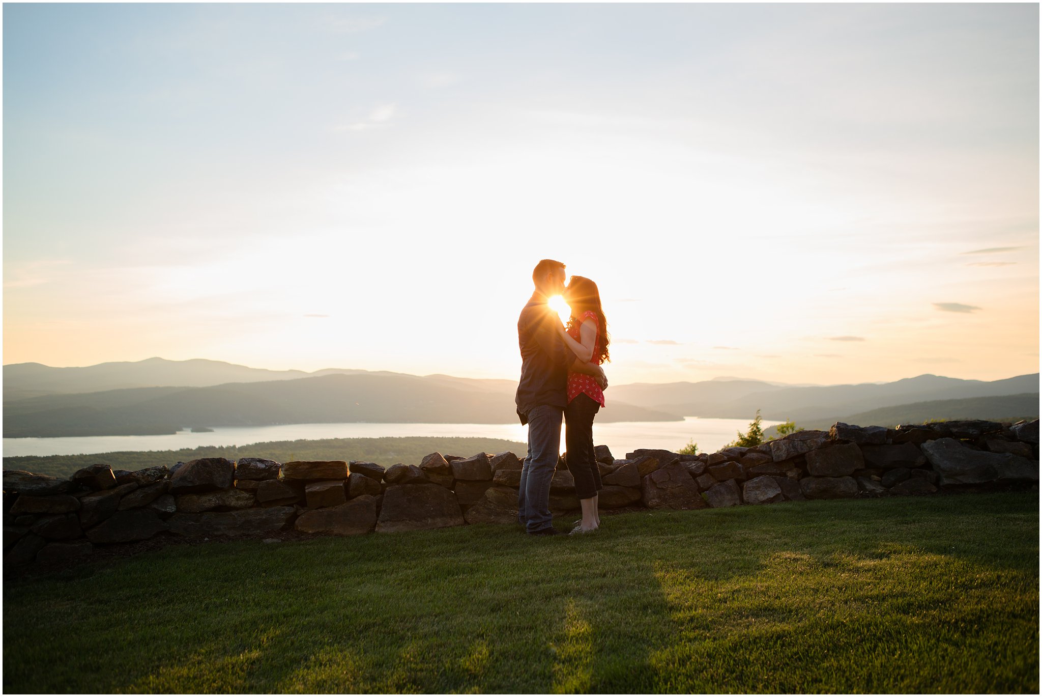 Couple Kissing at Sunset with Sunflare