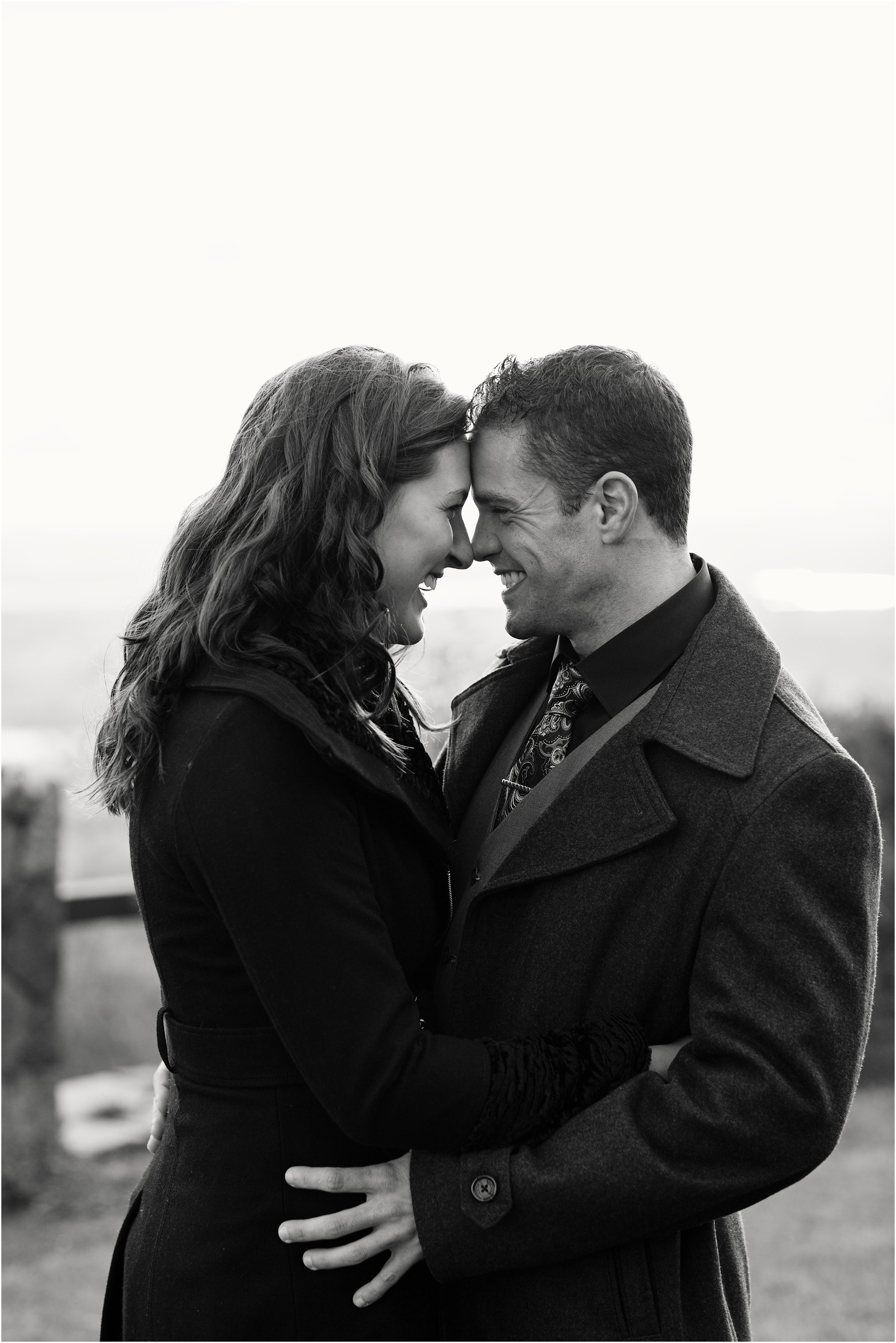 Newly-engaged couple black-and-white