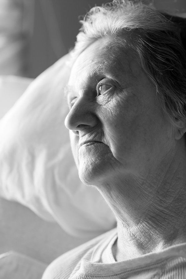 Black & White Portrait of Elderly Woman Watching Birds