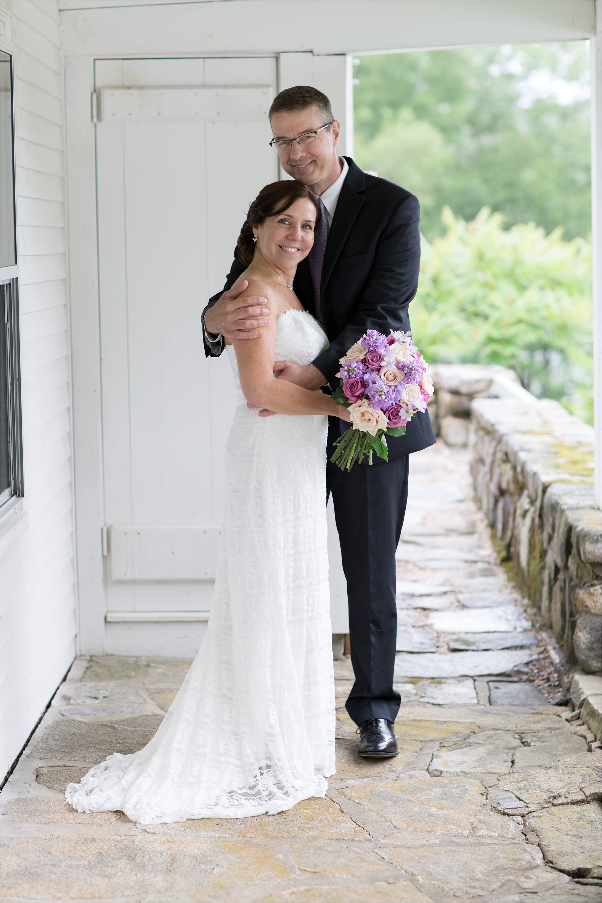 Bride and Groom on Porch (C) Maundy Mitchell