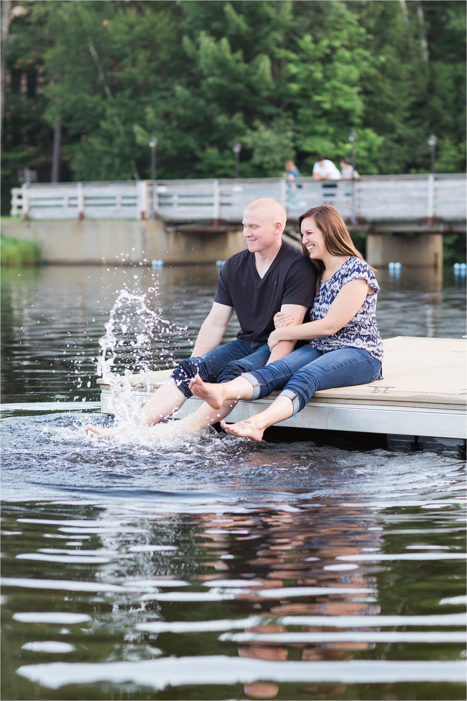 Couple playing in water (c) 2015 Maundy Mitchell