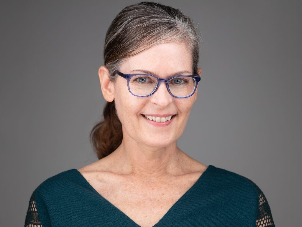 Ivan Weiss headshot of Maundy Mitchell, smiling