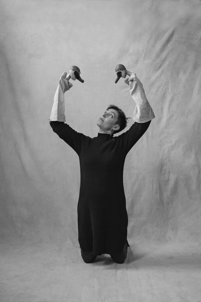 Sarah Wright, London-based puppeteer, with two hand puppets