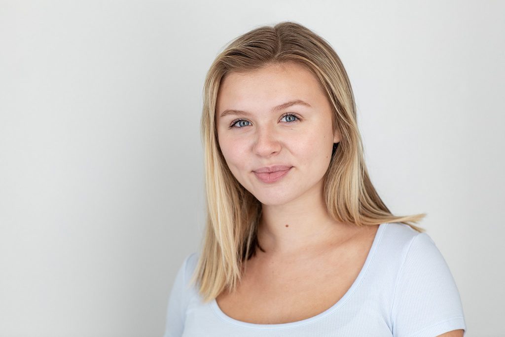Actor headshot on light background