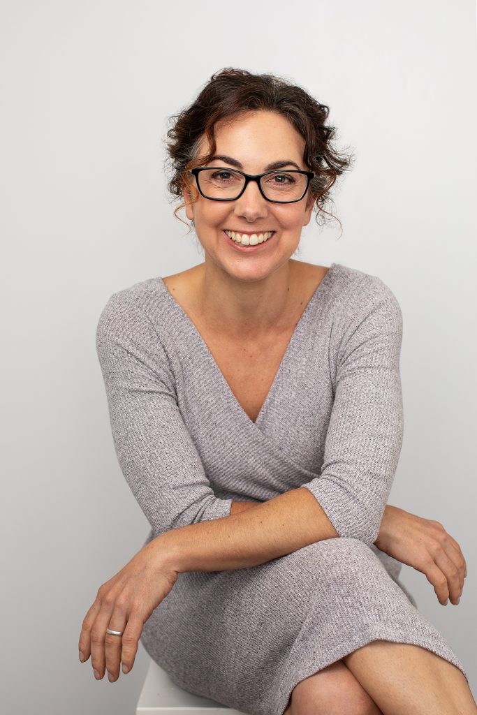 Personal branding portrait of Kayte wearing glasses