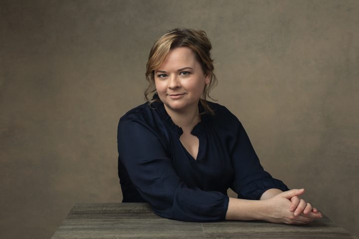 Portrait of Natalie Taylor at desk.