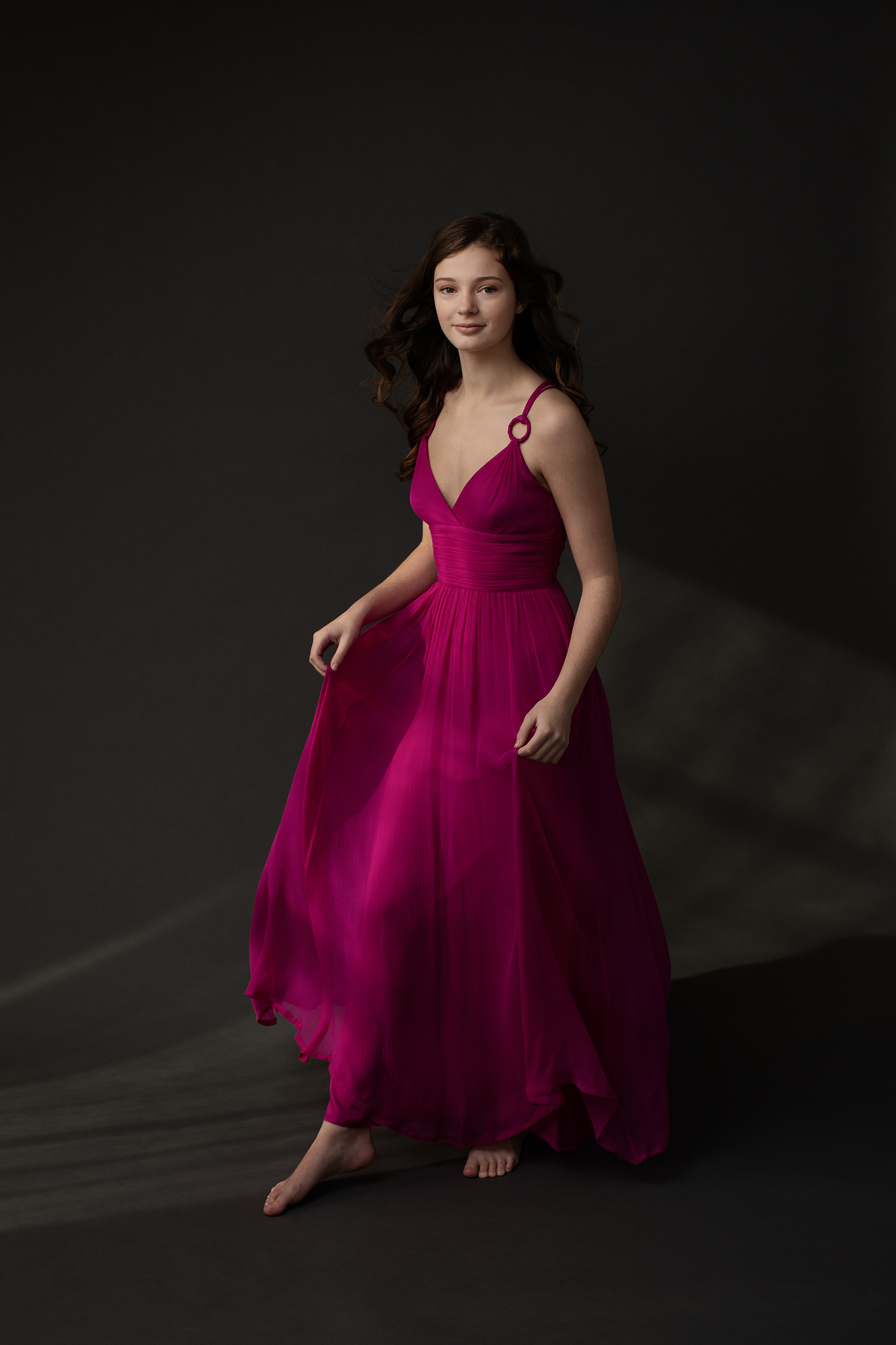 Senior Portrait of Emma Stepping Into Light