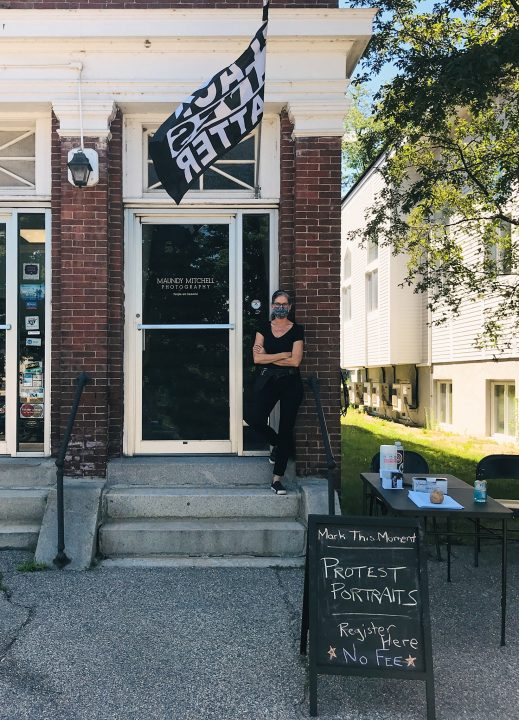 Photographer Maundy Mitchell outside her studio in downtown Plymouth, New Hampshire