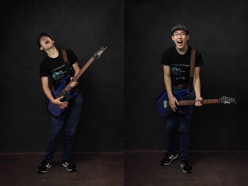 Studio portraits of teenage boy with guitar