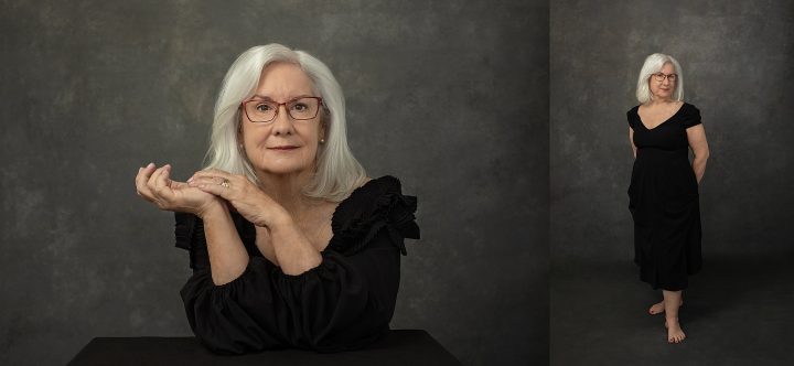Women's studio portraits in black dress on dark background