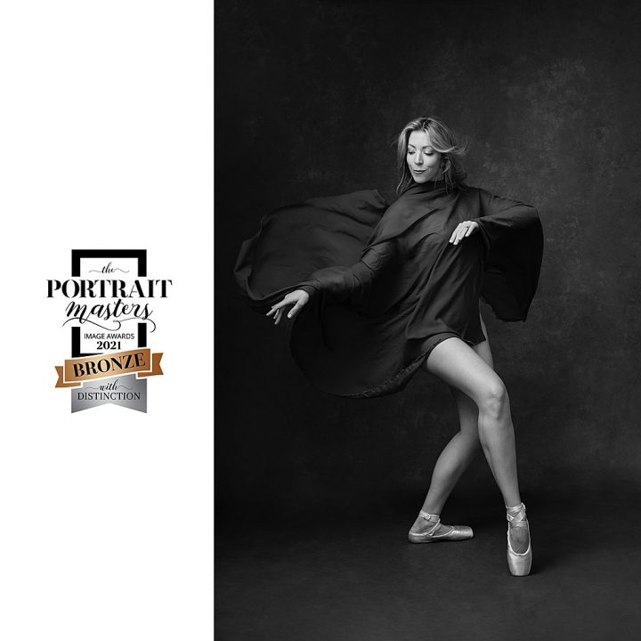 Black and white portrait of dancer,  dancing with silk fabric