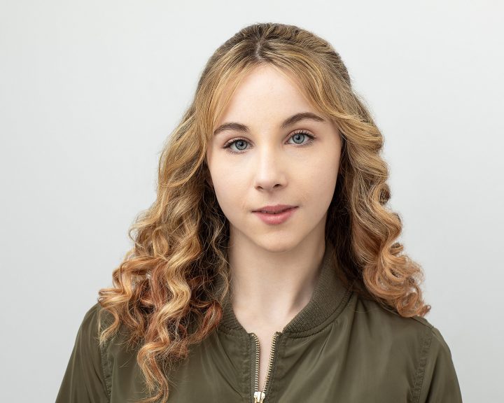 Acting headshot with light background for theatre student Lily