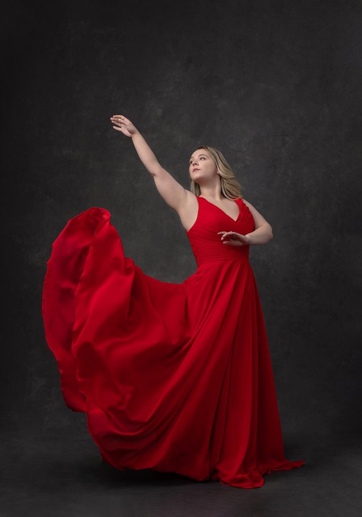 Little, fierce: dancer Suzanna wearing a red dress