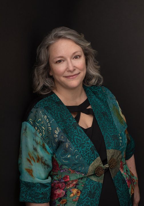 Nicole, wearing a kimono top for her portrait experience, Extraordinary: the Over 50 Revolution