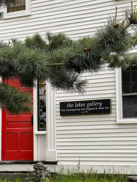 The sign on the building of The Lakes Gallery at Chi-Lin in Laconia, NH