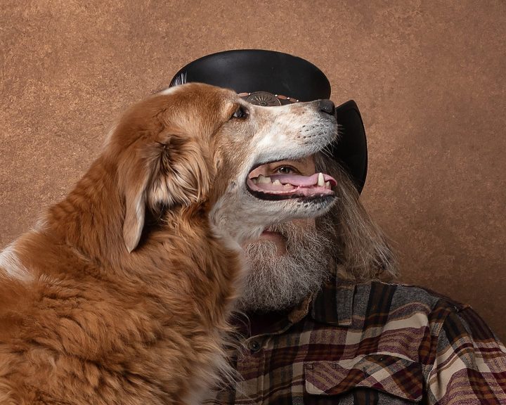Portrait of Mark looking through Marley's open mouth