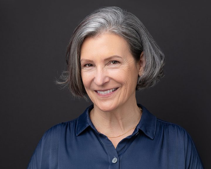 Headshot with black background for Patty O'Neill, voice actor