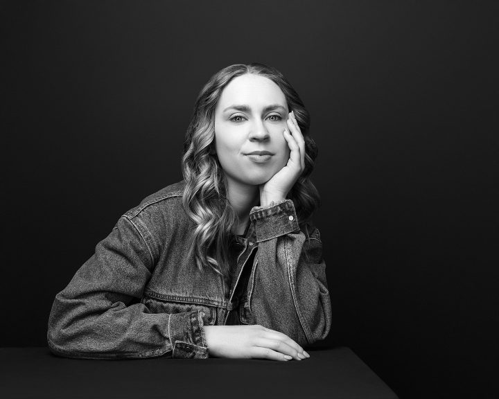 A black and white portrait from Kenzie's five year update photo session
