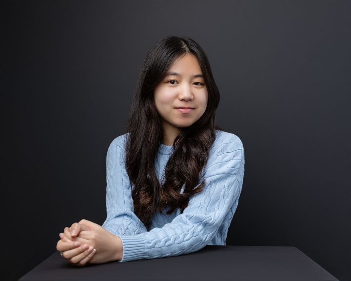 Personal branding portrait for actor Dora with black background