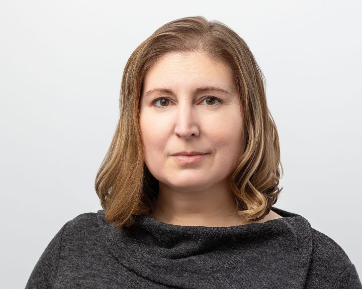 Headshot of Carolyn with white background