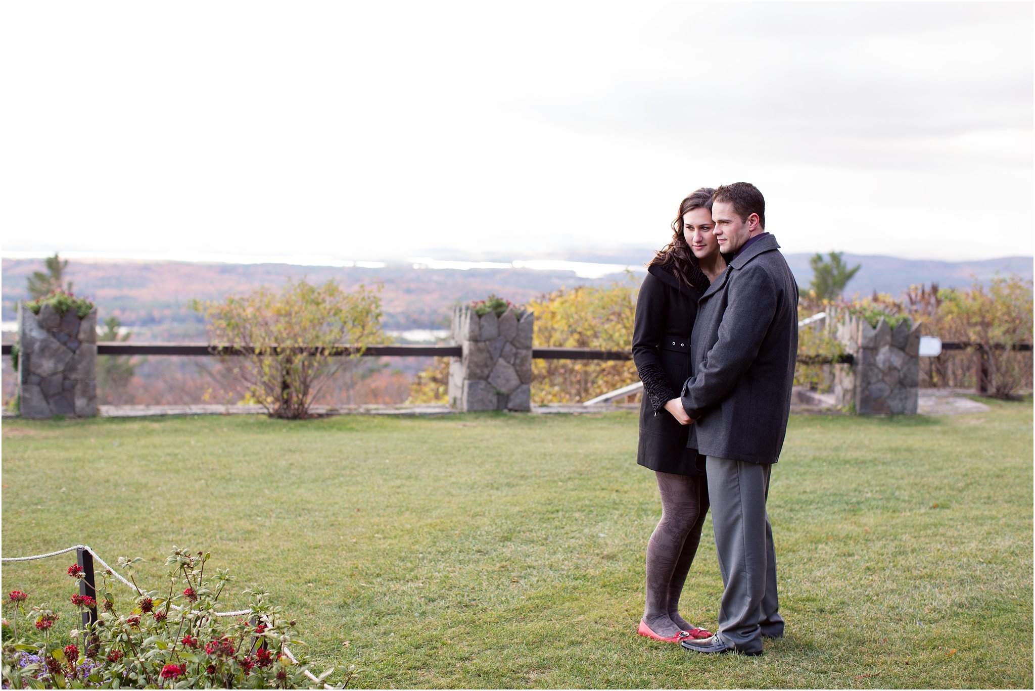 Engaged couple by garden at Castle in the Clouds, NH