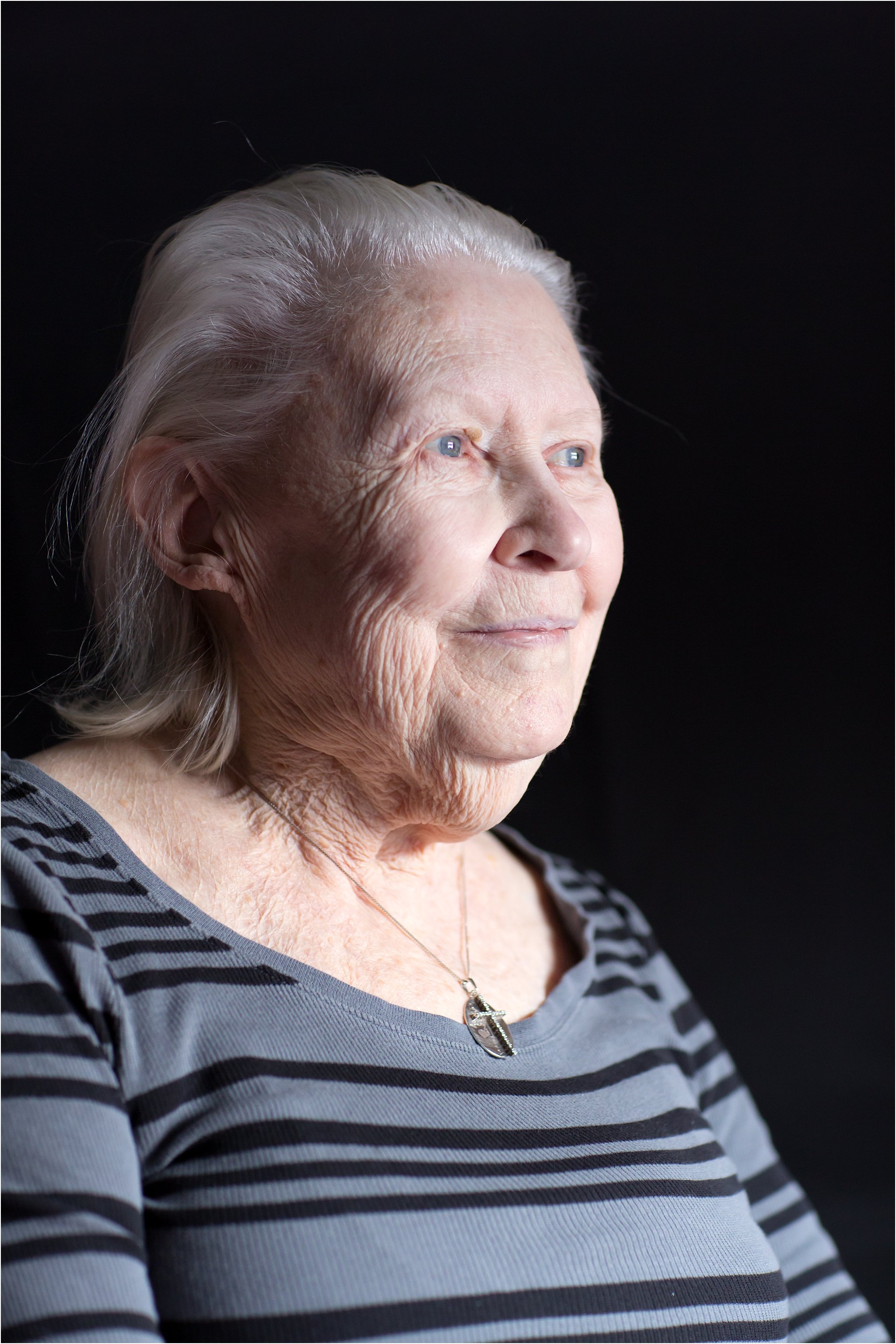 Portrait of Elderly Woman with Black Background