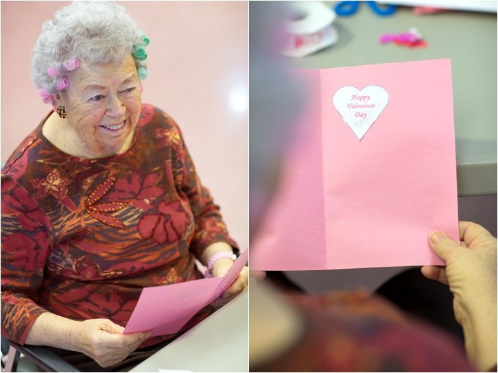 Elderly woman with hair curlers and a Valentine's Day card