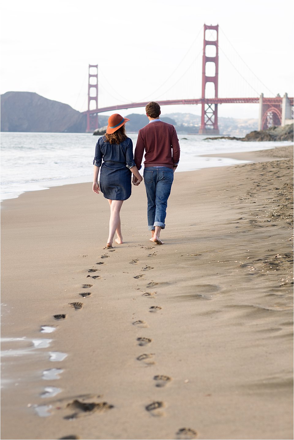 Couple Walking on Beach Golden Gate Bridge