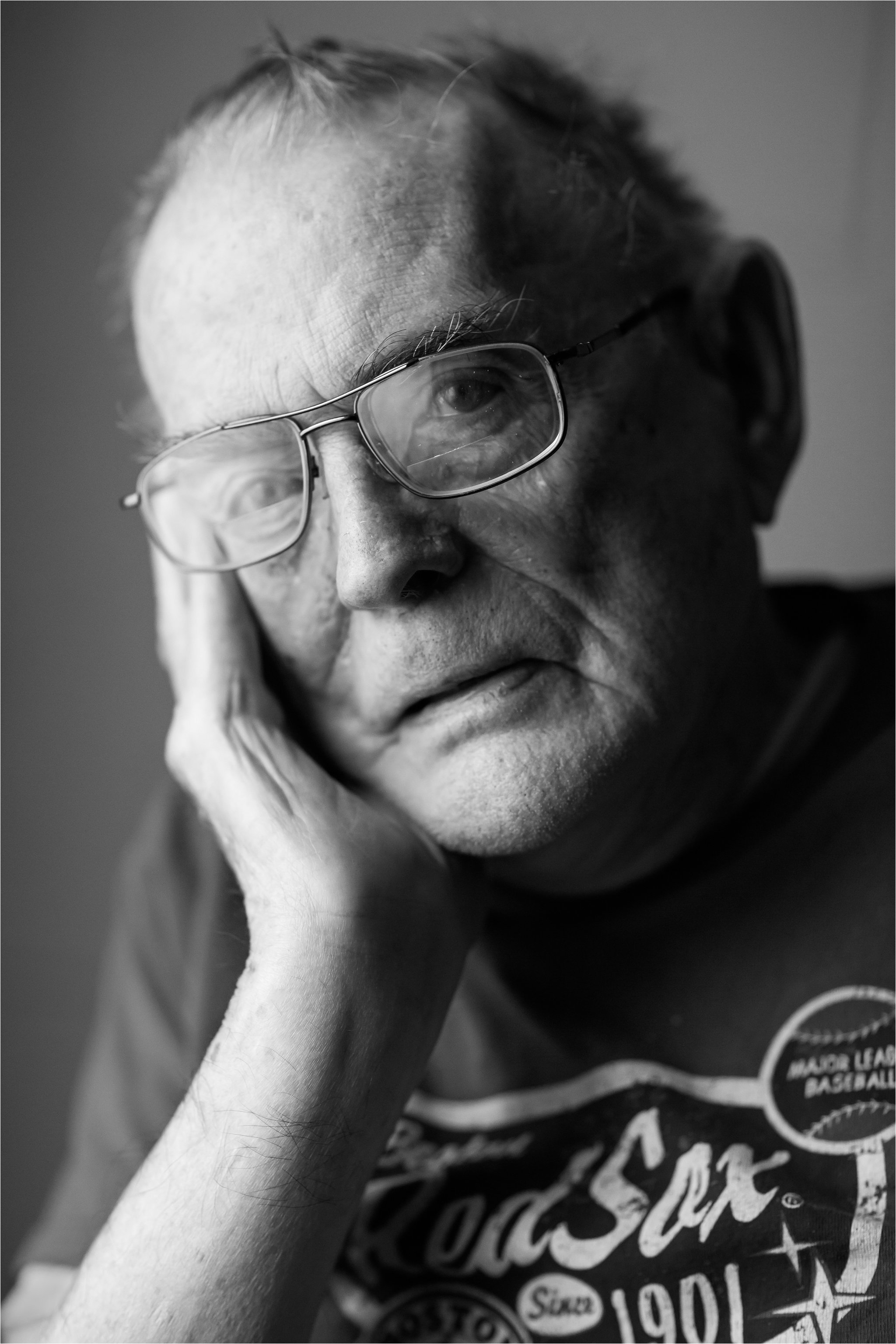 Black and White Portrait of Elderly Man Wearing Red Sox Shirt 2