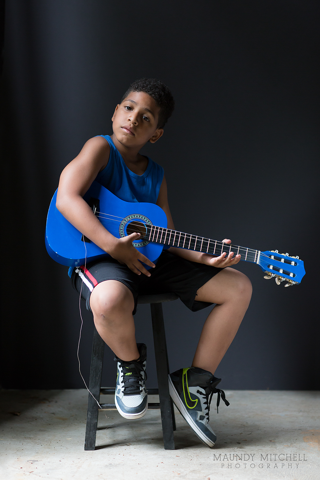 Boy With a Blue Guitar © Maundy Mitchell