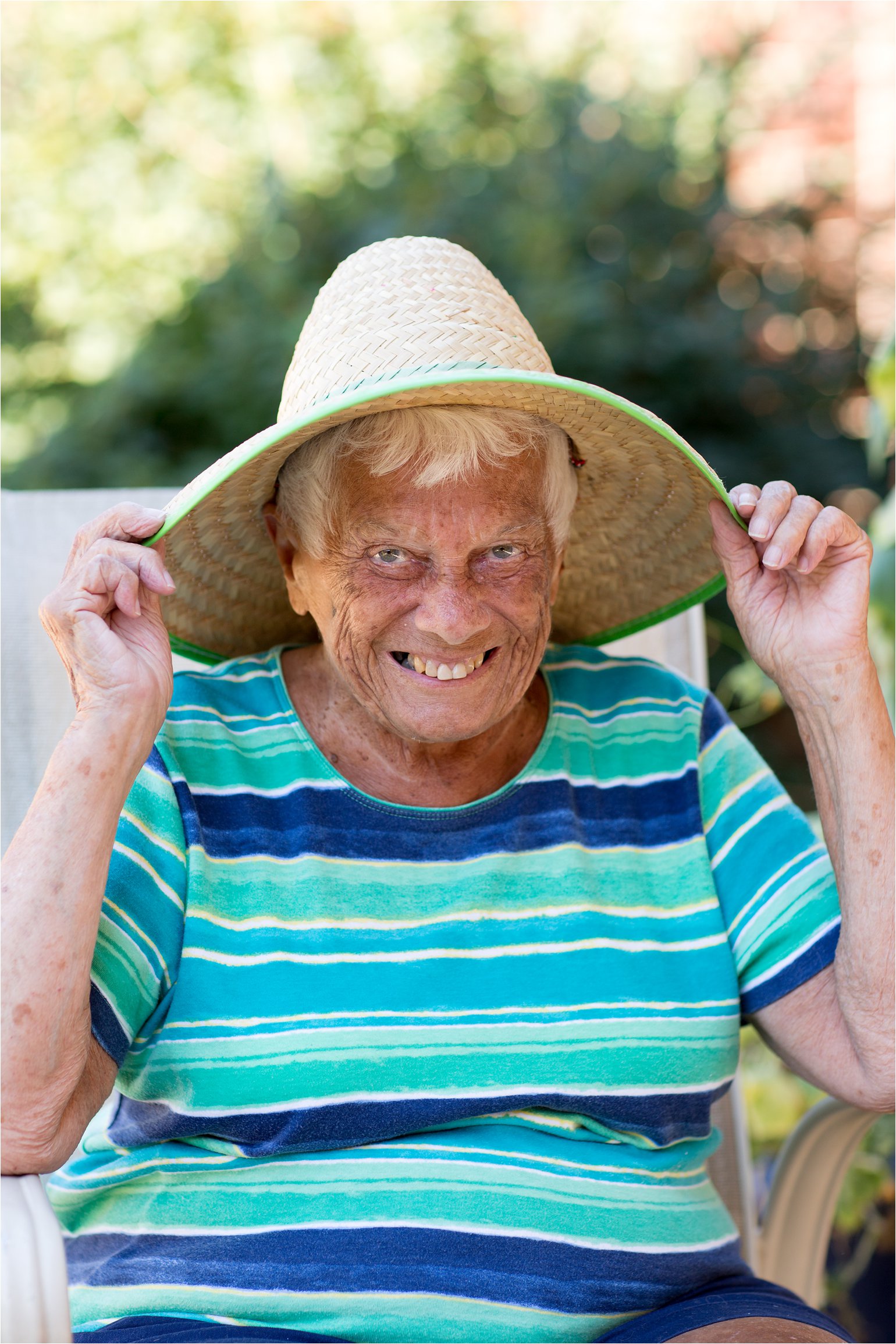 Tan Elderly Woman in Hat 2 (C) Maundy Mitchell