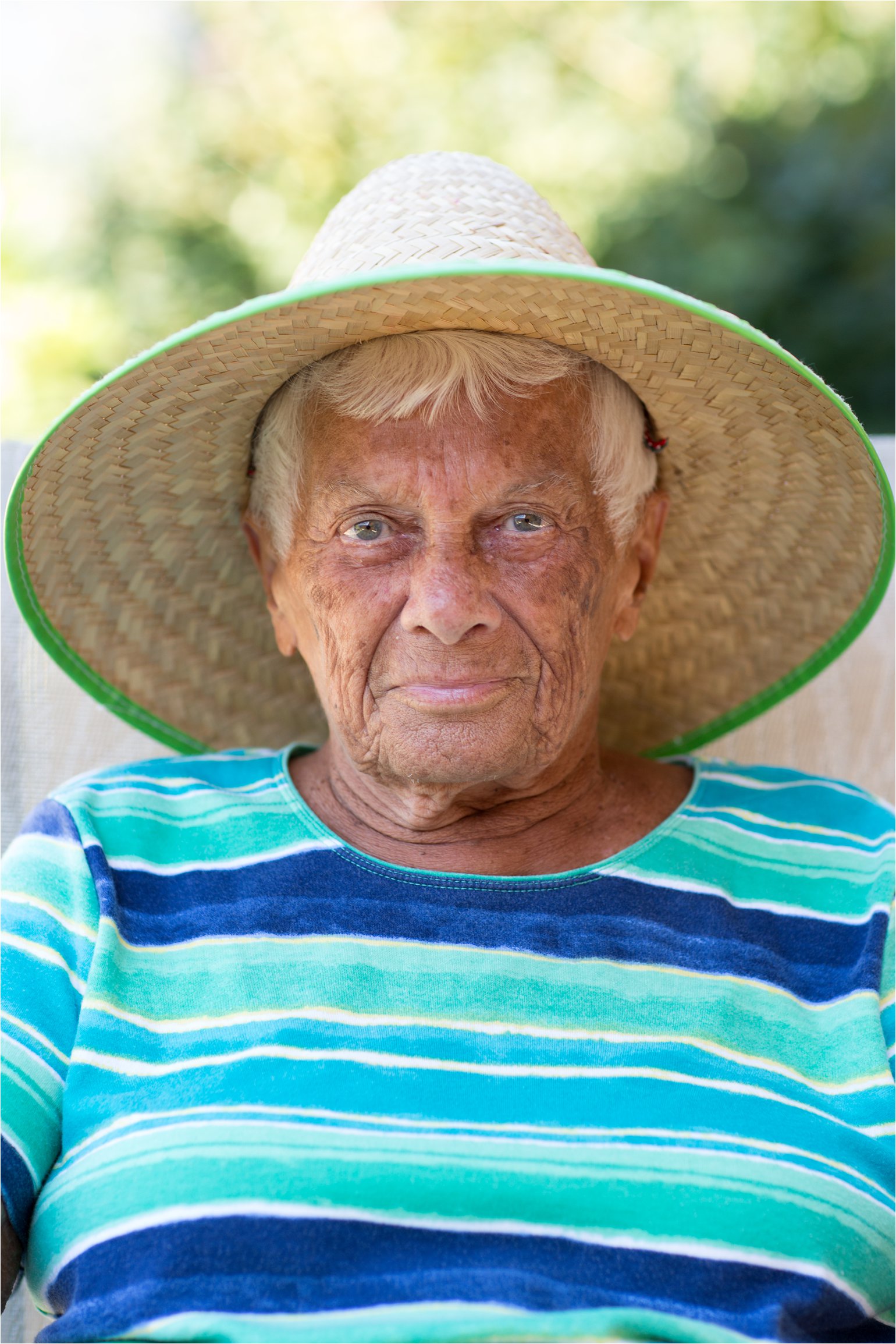 Tan Elderly Woman in Hat (C) Maundy Mitchell