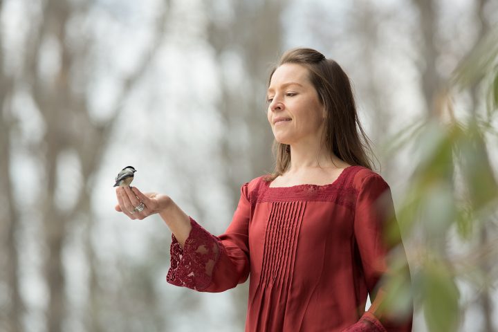 Tish Hand-Feeding Chickadees © Maundy Mitchell 2017