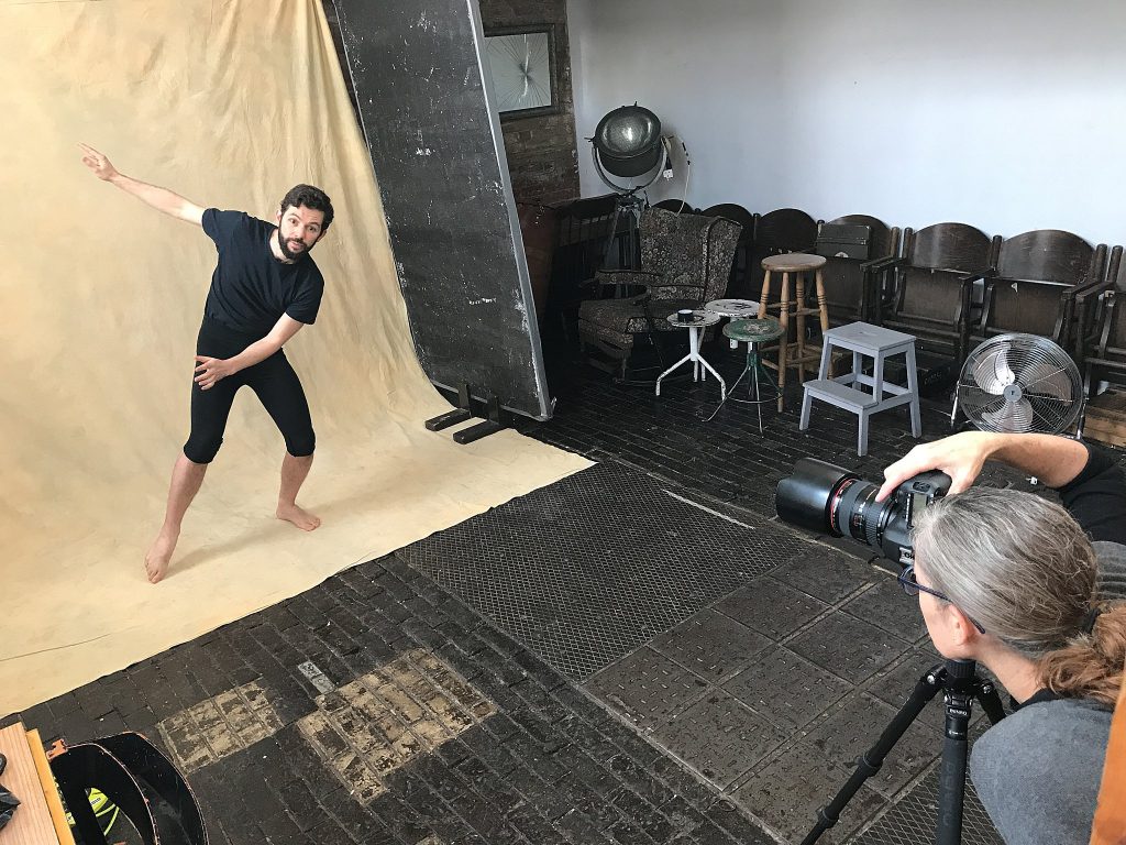 Behind the scenes cell pic of photographer Maundy Mitchell working with London mime Ramon Ayres.