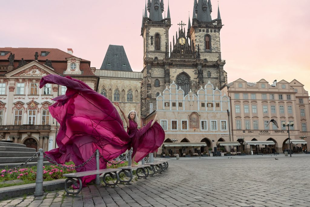 Dancer Lisa Travis in front of the Church of Our Lady before Týn, Old Town Square, Prague