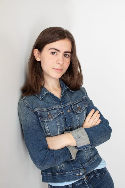 Actor headshot in NH - Kitty in denim jacket with arms crossed