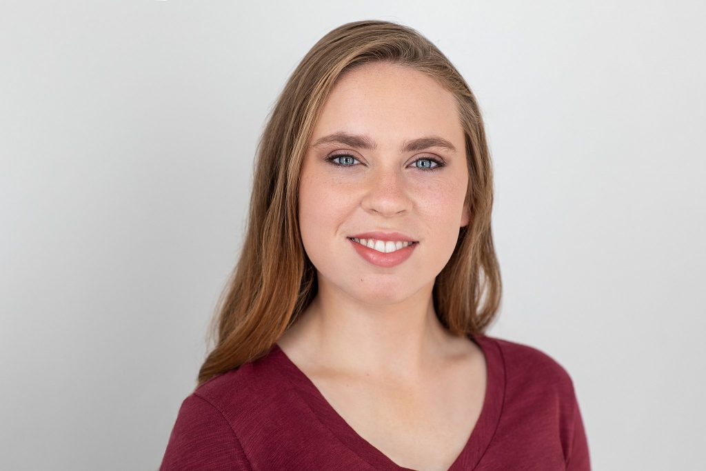 Actor headshot - Kenzie in red t-shirt