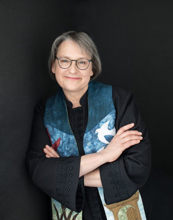 Portrait of Rev. Linda Barnes wearing her ordainment stole.