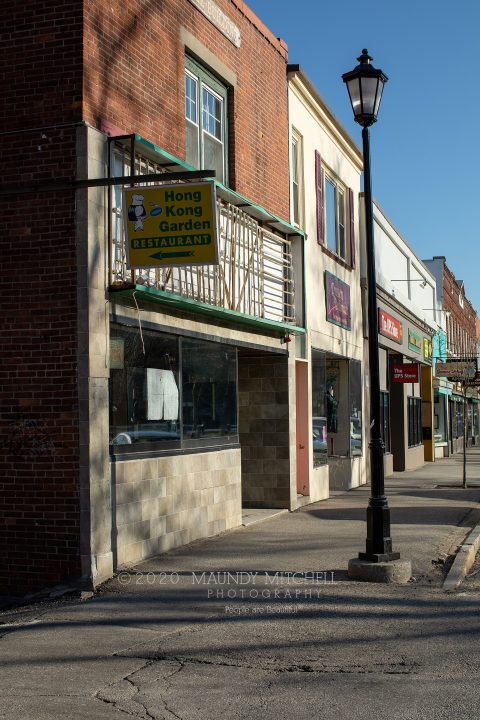 Closed restaurants and shops in downtown Plymouth, NH on a Saturday afternoon