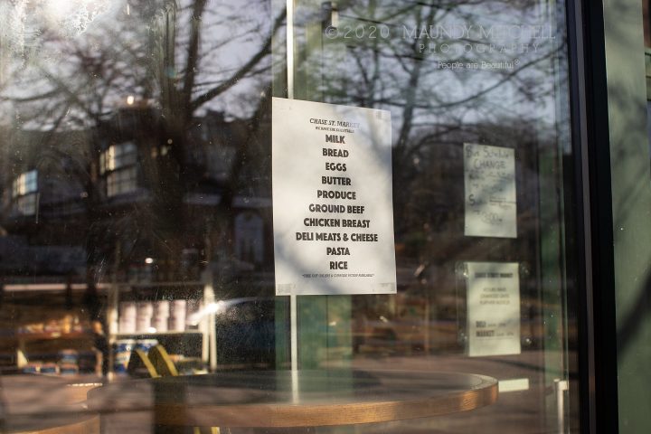 Sign in the window of a market