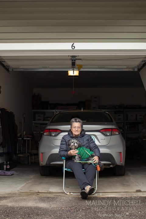 My mother sits just inside her garage with her dog, Gertie