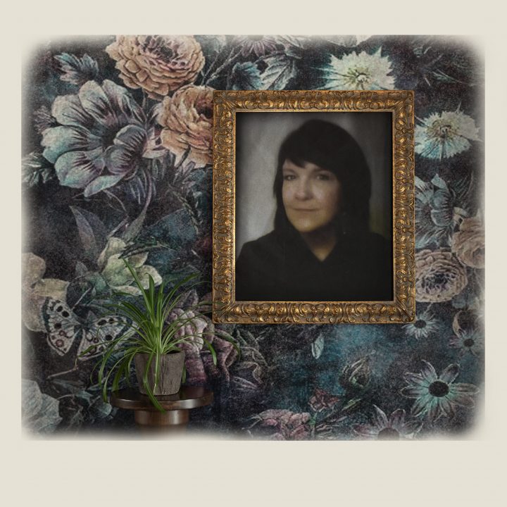 A virtual live portrait of Kree projected into an antique frame with a floral wallpaper background.
