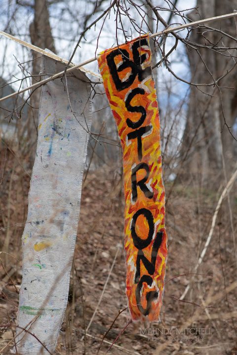 Hand painted sign "be strong"