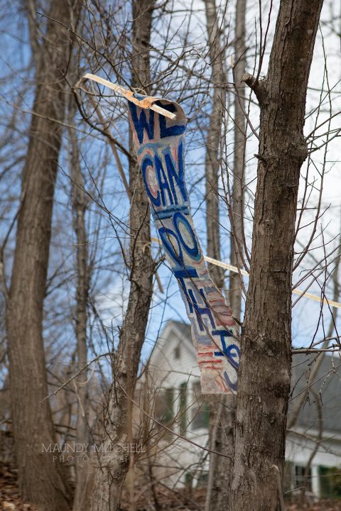 Hand-painted sign "We can do this"