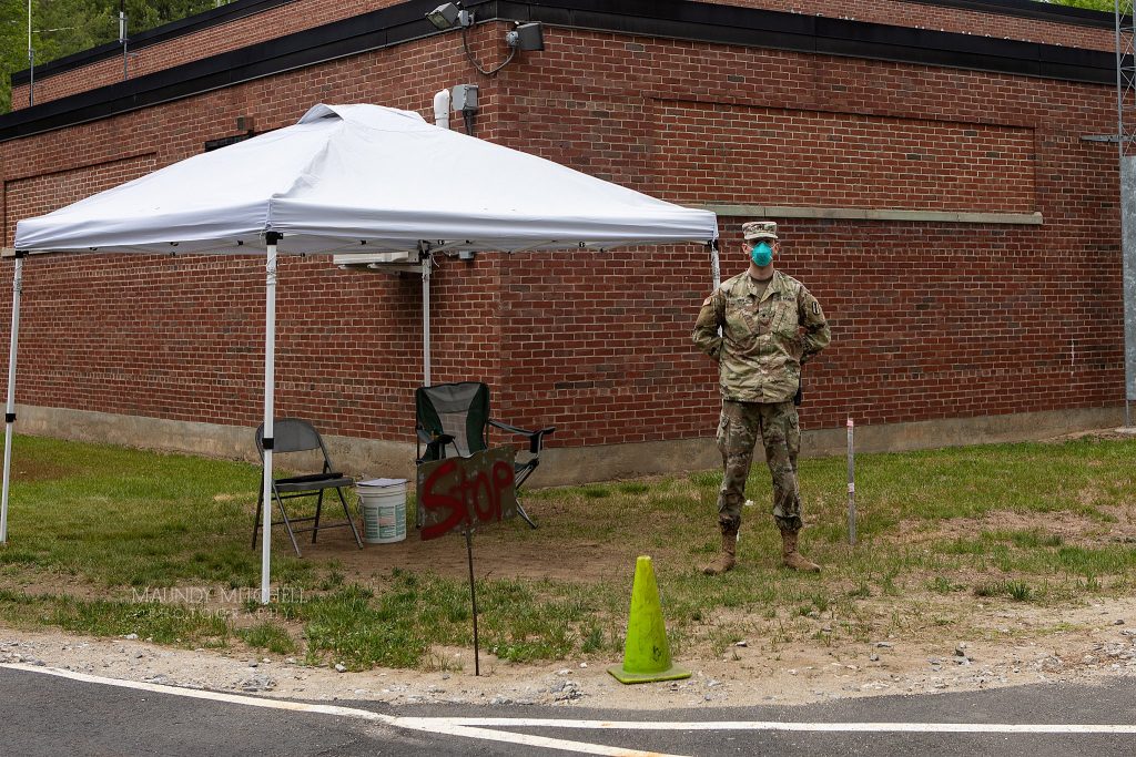 A soldier at the National Guard Armory in Plymouth, NH stands ready to assist anyone who might want a COVID-19 test.