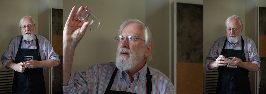 Photos of Gary Samson cleaning a beaker as part of the wet plate collodion process