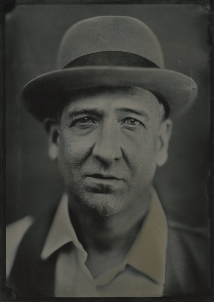 5x7 tintype portrait of a man wearing a bowler hat